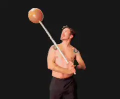 Man spinning lollipop on stick