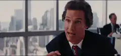 Gordon Gekko eating a grape