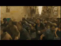 zombies running down a street