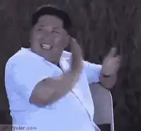 Kim Jong Un laughing and clapping