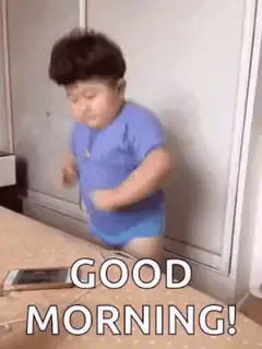 Toddler dancing with good morning text