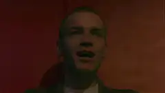 Ewan McGregor as Mark Renton talking