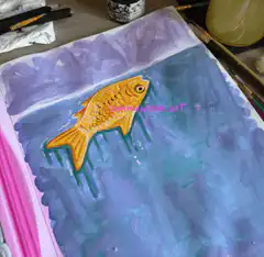 Painted goldfish on purple watercolor