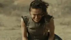 Two women hugging in the desert