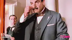 Hercule Poirot adjusts his glasses