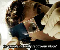 Guy looking at eye with magnifying glass