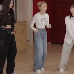 Three women dancing in a studio