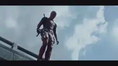 Deadpool jumps onto a car