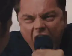 Leonardo DiCaprio yelling into microphone
