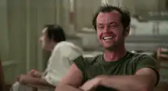 Jack Nicholson laughing and facepalming