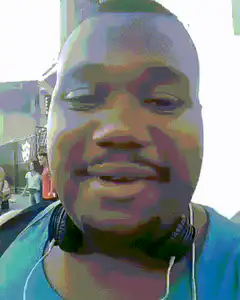 Man laughing with friend on street