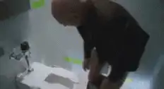 Man pees on toilet then floor