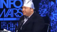 Alex Jones wearing a tinfoil hat