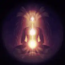 Meditating figure with glowing chakras