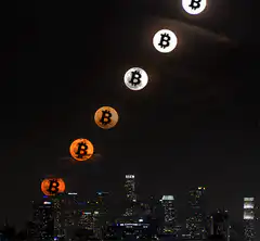 Bitcoin moons over city skyline