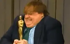 John Goodman laughing with Oscar