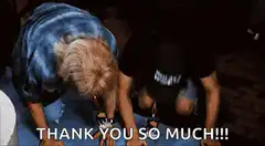 Two people bowing and raising hands