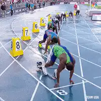Track runner trips on starting block