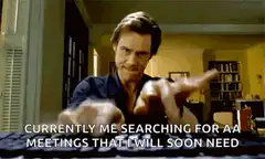 Jim Carrey pointing at camera with text