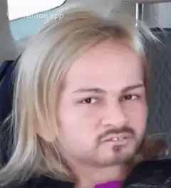 Man with blonde wig and mustache