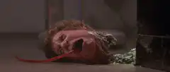 Woman spitting out a long red tongue