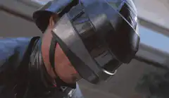 Judge Dredd hits man with baton