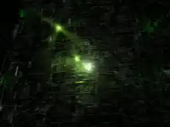 green glowing lights on dark textured wall