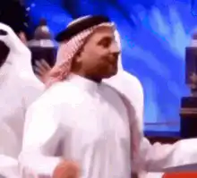 Arab man dancing and pointing