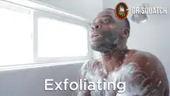 Man exfoliating in shower