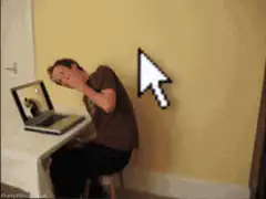man dodging giant cursor