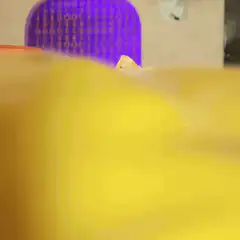 Tortilla chip character with cheese hair