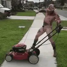 Shirtless man mowing lawn in underwear
