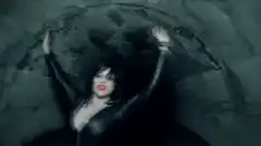 Woman in leather in a tunnel