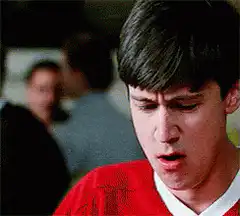 Todd O'Brien sneezes into his hand