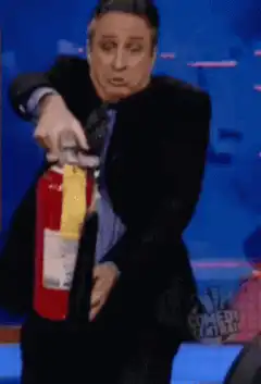Andy Richter fires fire extinguisher