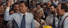 Jordan Belfort yelling at the penny stock broker