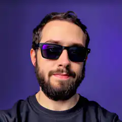 Man in sunglasses with purple background