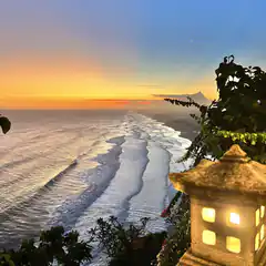 beach sunset with stone lantern