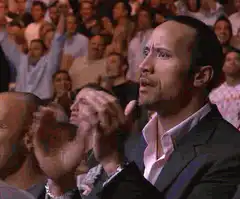 Dwayne Johnson clapping in audience