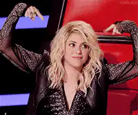 Shakira pointing down