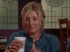 Phoebe Buffay holding coffee cup