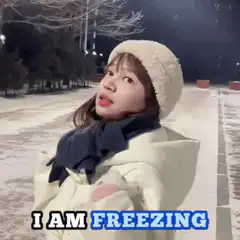 Girl shivering in snow saying I am freezing