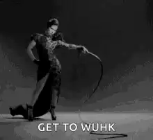 Woman cracking whip get to wuhk