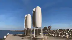 Two vertical axis wind turbines spinning