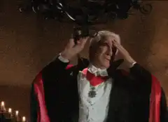 Dracula falls into coffin