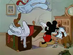 Mickey Mouse packing clothes