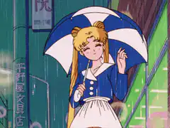 Sailor Moon holding an umbrella in the rain