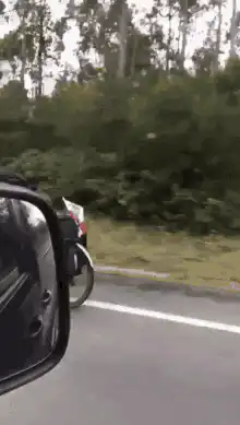 Cyclist riding with head down