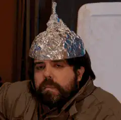 Man in tinfoil hat screaming