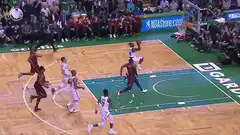 NBA player dunk over defender